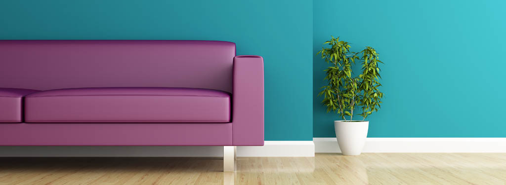 Ultra violet purple sofa in turquoise room